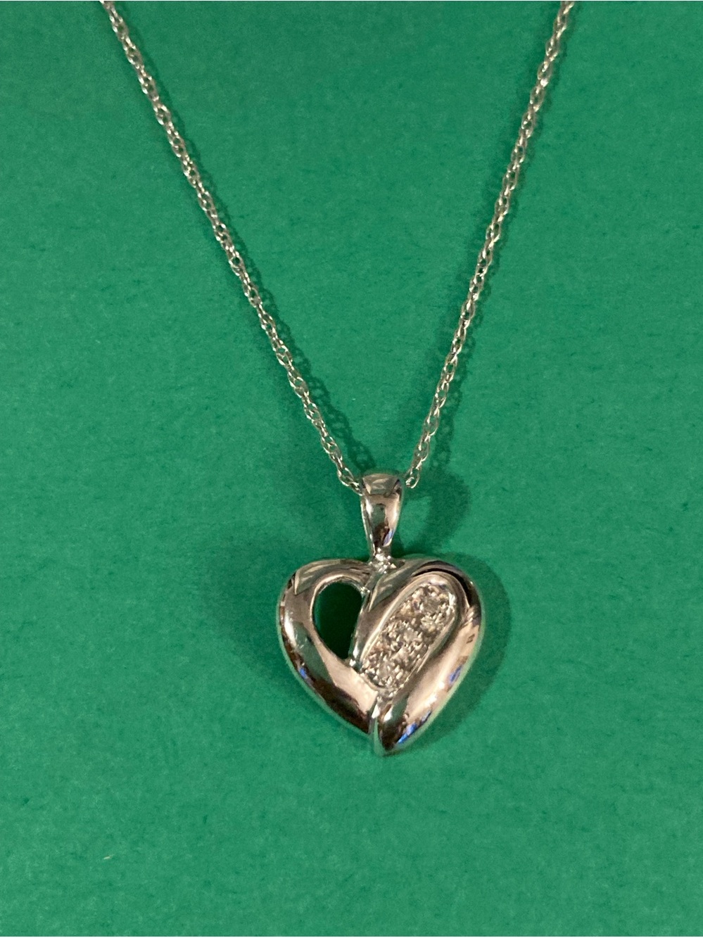 Gold Heart Chain with 3 diamonds. 10k gold signed